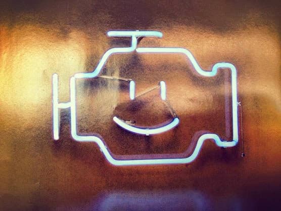 Check engine neon sign at the shop
